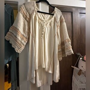 NWOT- free people- cream colored top with crochet flowy sleeves Large
